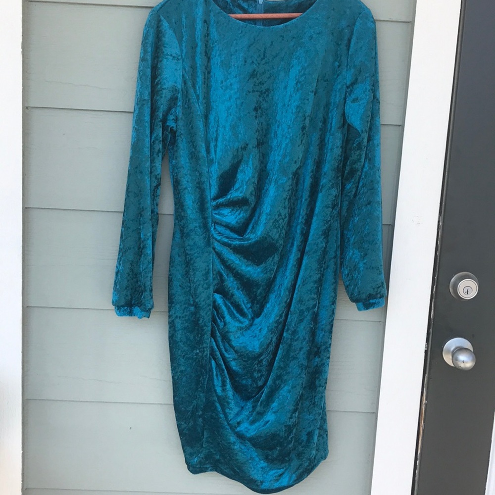 Crushed blue-green velvet body shaped dress.